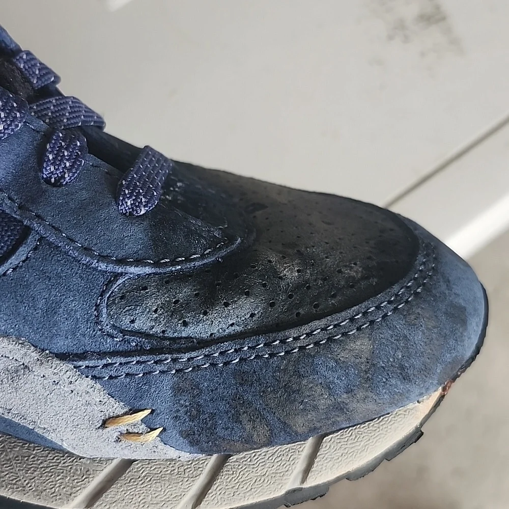 Saucony Blue and Yellow Sneakers Small stains of ink on both tennis in front